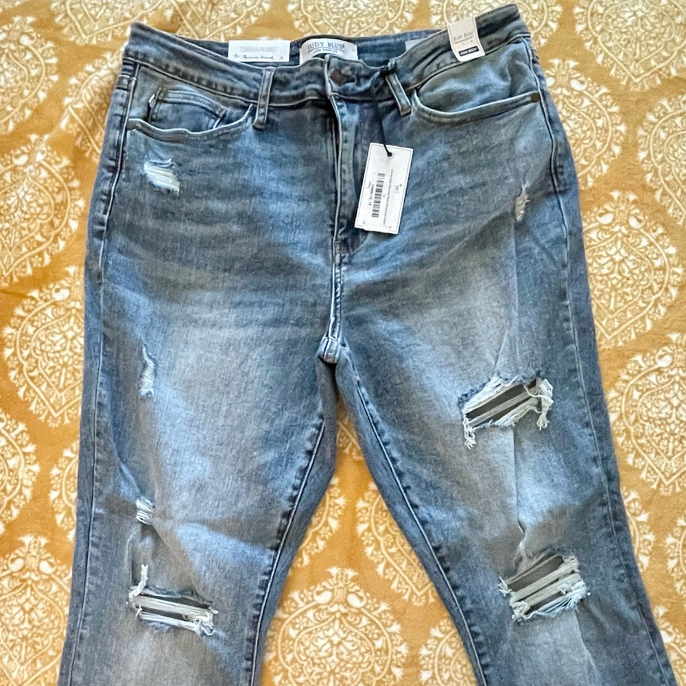 Judy Blue. New with tags destroyed denim high waist slim fit. Size 15/32.